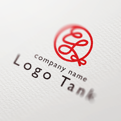 赤い糸で「糸」の文字を描いたロゴ