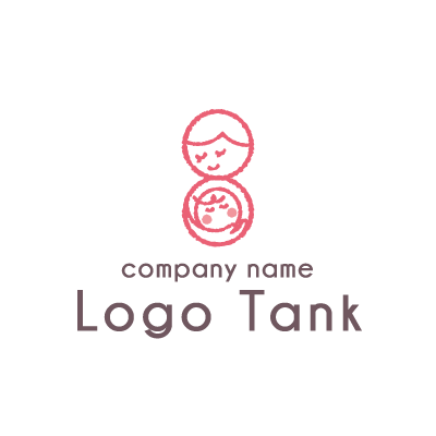 赤ちゃんを抱いているママ