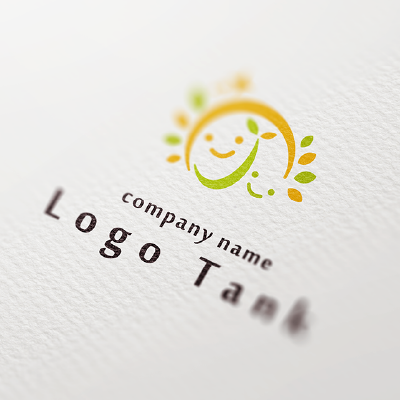 「の」の文字と太陽・笑顔・双葉をモチーフにしたロゴ