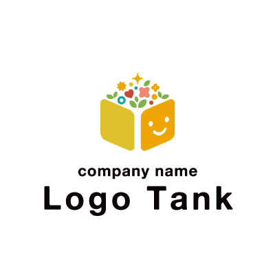 おもちゃ箱と笑顔をモチーフにしたロゴ