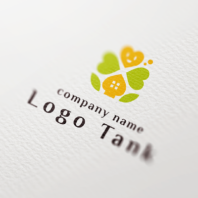 四つ葉と笑顔、ホームをイメージしたロゴ