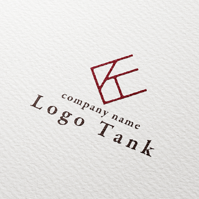 一片がかけた菱形に「K」のロゴ