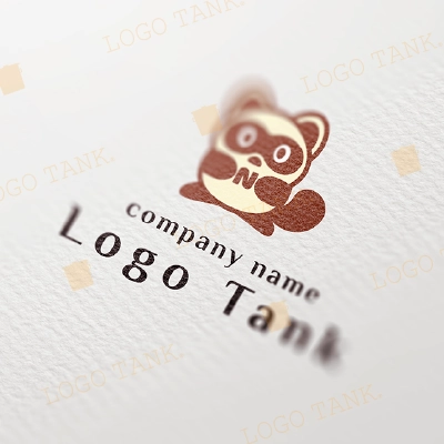 かわいいタヌキがアルファベットを持ったロゴ
